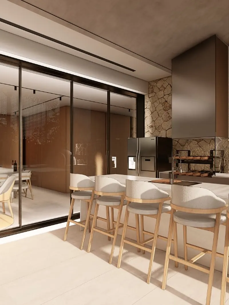 Projeto de área gourmet com bancada, banquetas de madeira e parede de pedra